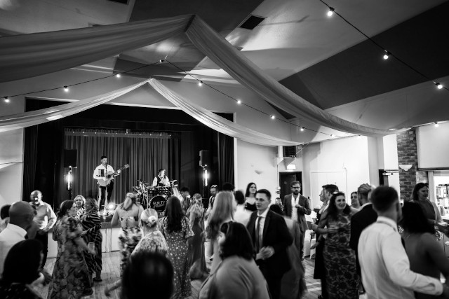 Uplyme Village Hall band on stage Uplyme Village Hall with a band on stage