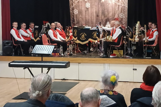 Uplyme Village Hall's stage with Lyme Regis Town Band